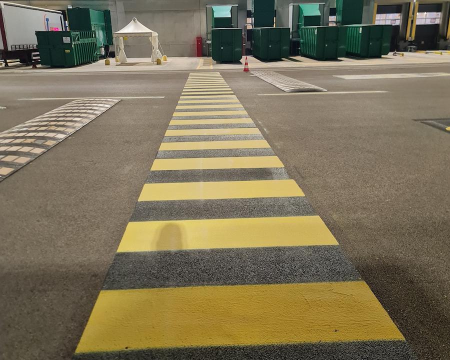 yellow safety markings on ground